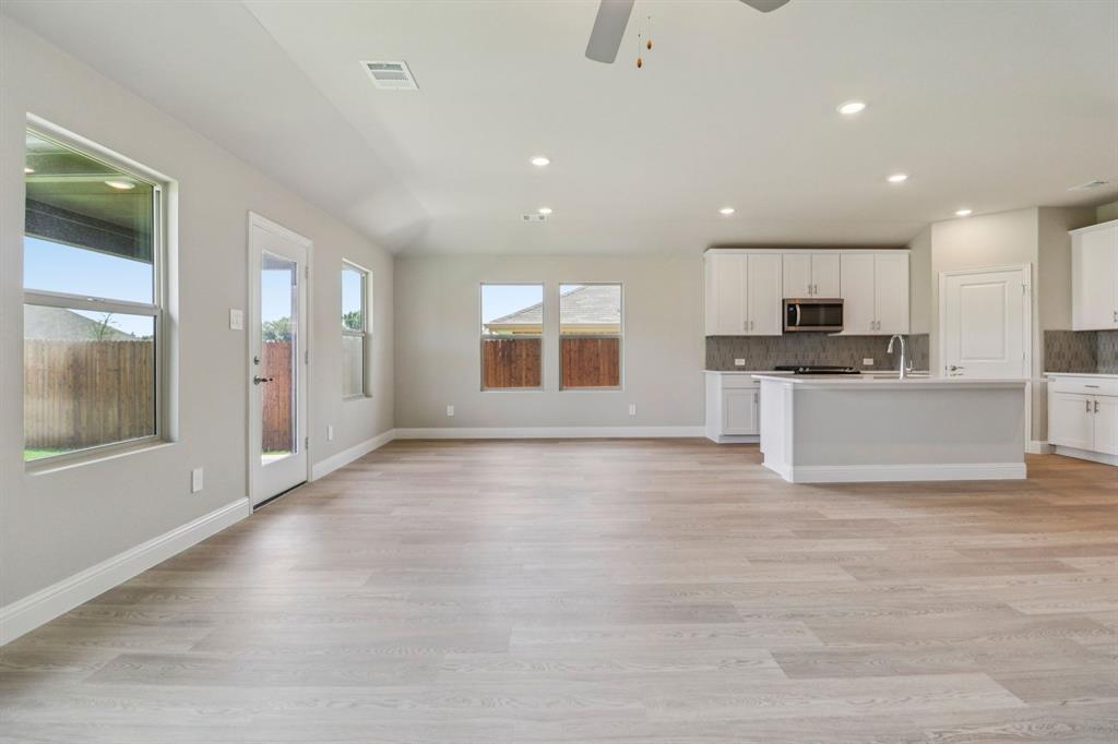 2226 Rannoch Street Sherman, TX 75092 - Photo 7 of 32 Photo is not of the actual home, but is an inspirational photo of builder’s model home and may depict options, furnishings, and/or decorator features that are not included.