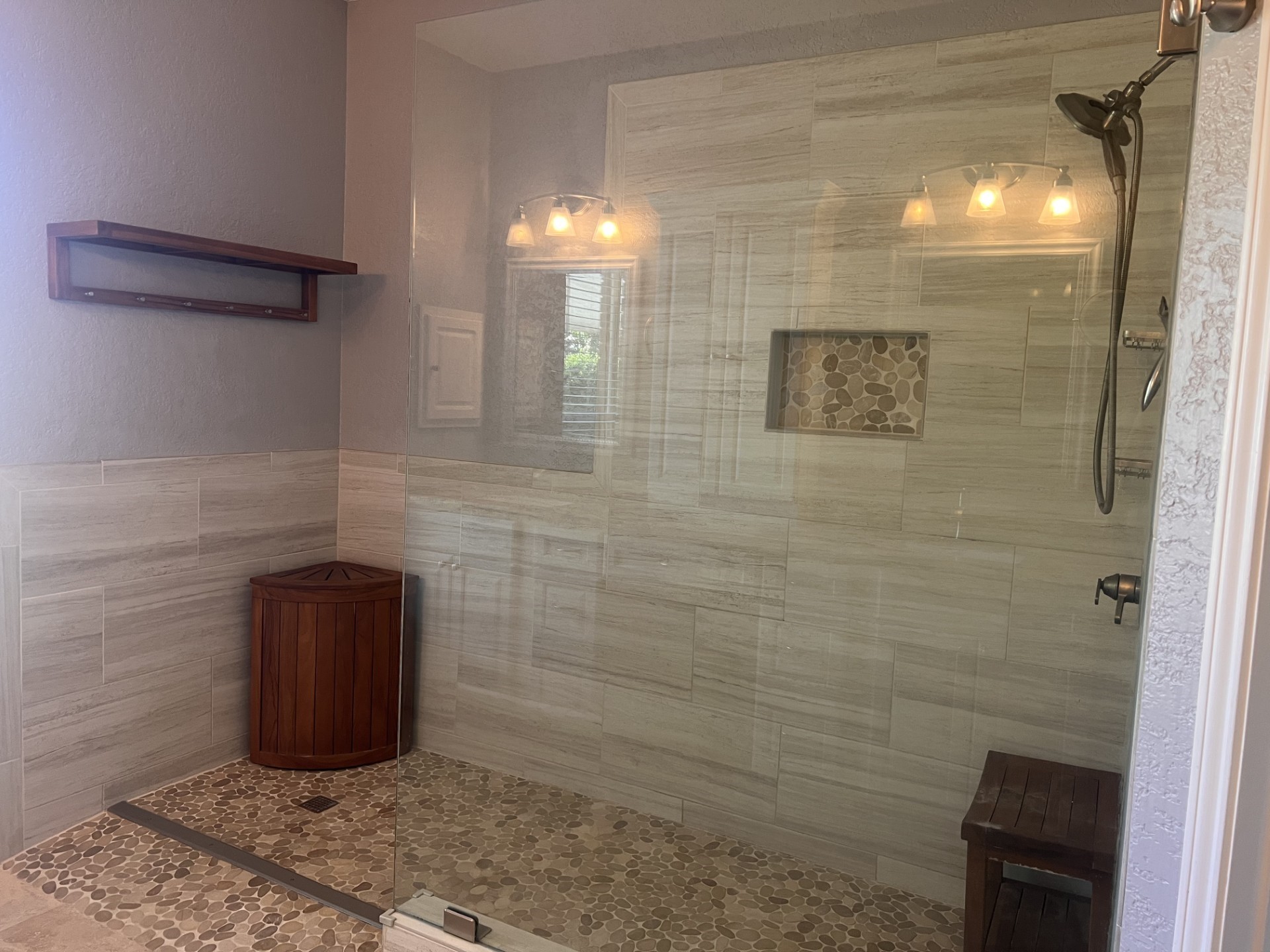 9327 Restover Lane Houston, TX 77064 - Photo 17 of 22 a bathroom with a shower