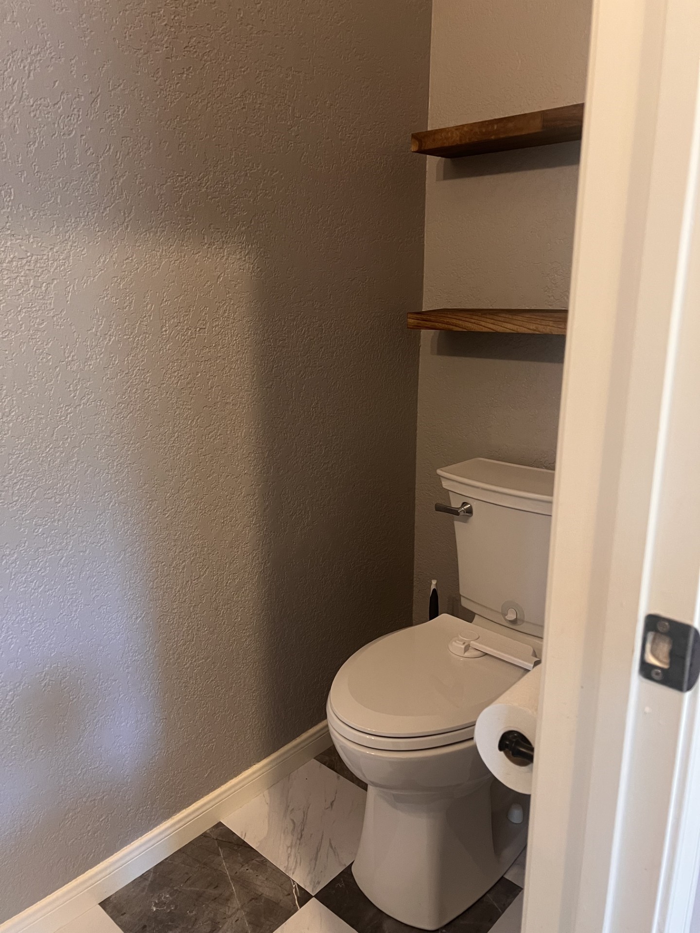 9327 Restover Lane Houston, TX 77064 - Photo 5 of 22 a white toilet sitting next to a shower