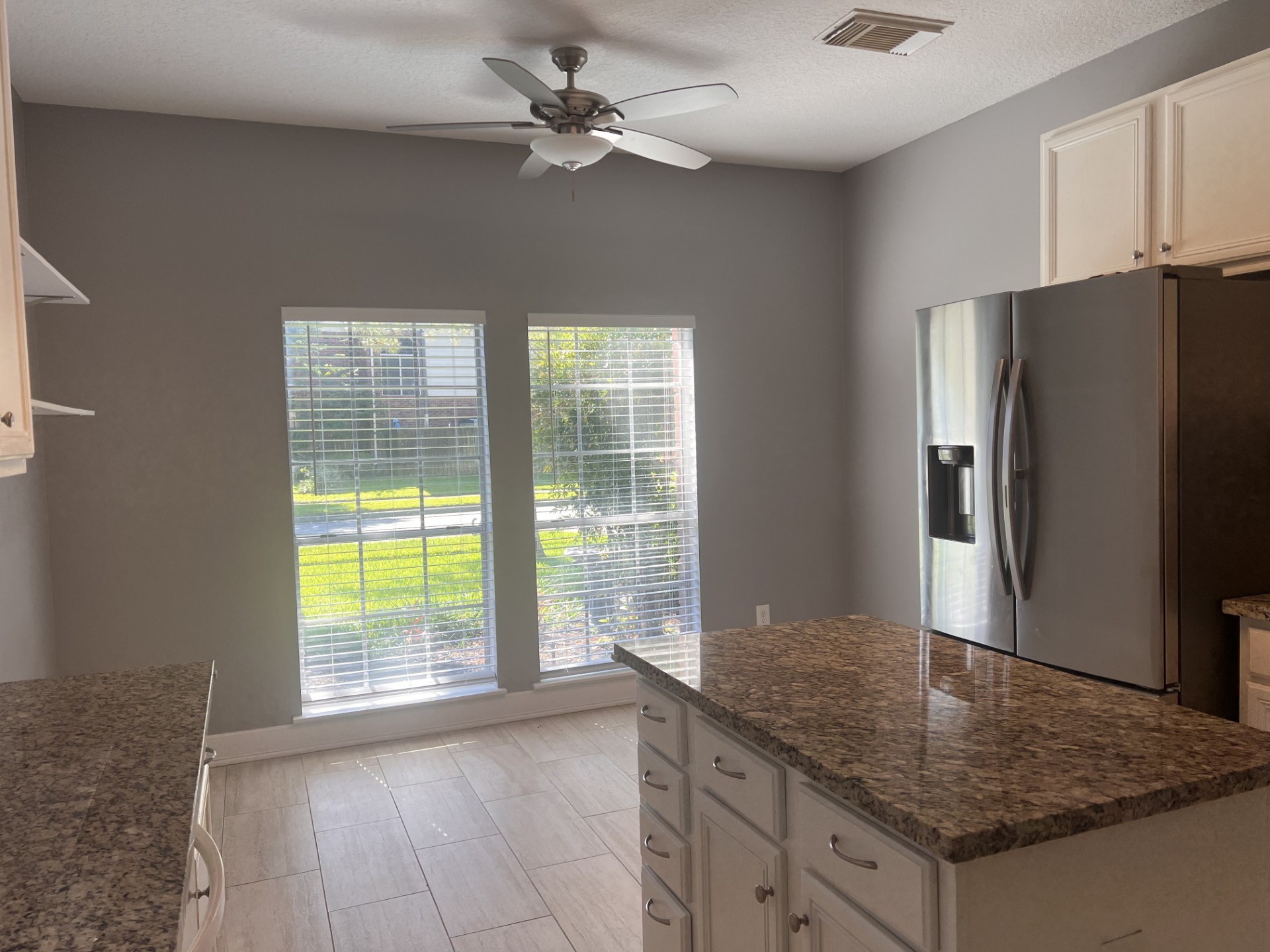 9327 Restover Lane Houston, TX 77064 - Photo 8 of 22 a kitchen with stainless steel appliances granite countertop a refrigerator a sink and dishwasher
