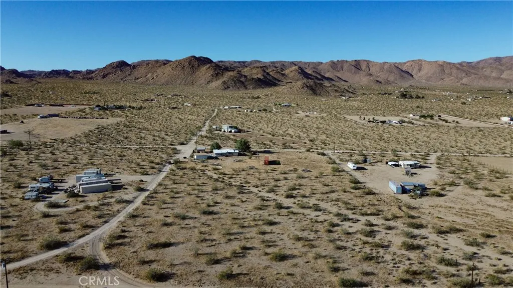 702 Bell Johnson Valley Johnson Valley, CA 92285 - Photo 11 of 12 Red boundary lines on pictures are an estimate and for marketing purposes only. Buyer to verify all aspects of this property including, but not limited to utilities, assessments, boundaries, usage, access, and zoning to satisfy themselves.
