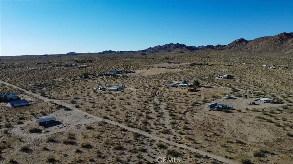 702 Bell Johnson Valley Johnson Valley, CA 92285 - Photo 12 of 12 Red boundary lines on pictures are an estimate and for marketing purposes only. Buyer to verify all aspects of this property including, but not limited to utilities, assessments, boundaries, usage, access, and zoning to satisfy themselves.