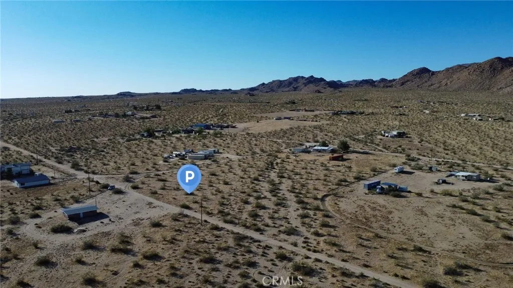 702 Bell Johnson Valley Johnson Valley, CA 92285 - Photo 4 of 12 Red boundary lines on pictures are an estimate and for marketing purposes only. Buyer to verify all aspects of this property including, but not limited to utilities, assessments, boundaries, usage, access, and zoning to satisfy themselves.