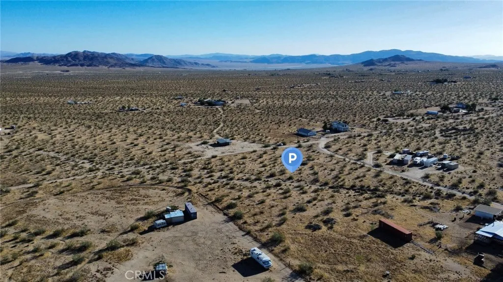 702 Bell Johnson Valley Johnson Valley, CA 92285 - Photo 5 of 12 Red boundary lines on pictures are an estimate and for marketing purposes only. Buyer to verify all aspects of this property including, but not limited to utilities, assessments, boundaries, usage, access, and zoning to satisfy themselves.
