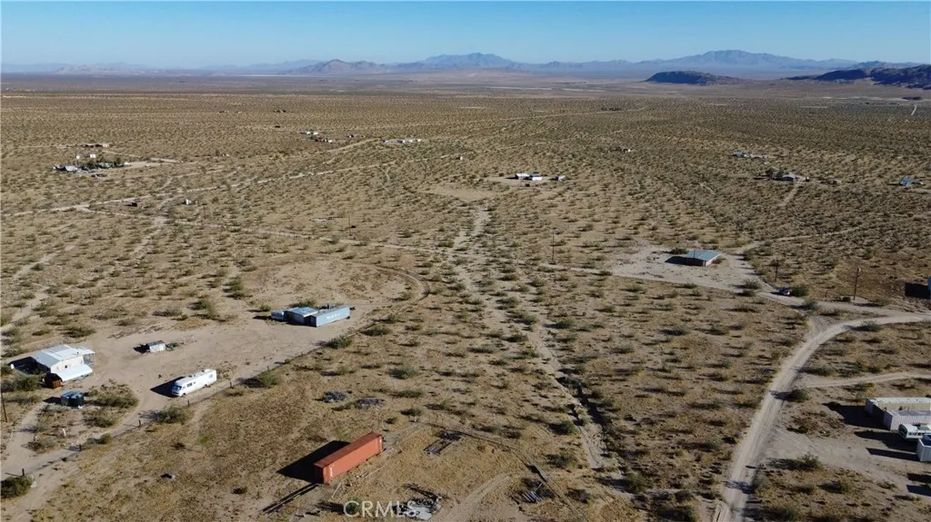 702 Bell Johnson Valley Johnson Valley, CA 92285 - Photo 10 of 12 Red boundary lines on pictures are an estimate and for marketing purposes only. Buyer to verify all aspects of this property including, but not limited to utilities, assessments, boundaries, usage, access, and zoning to satisfy themselves.