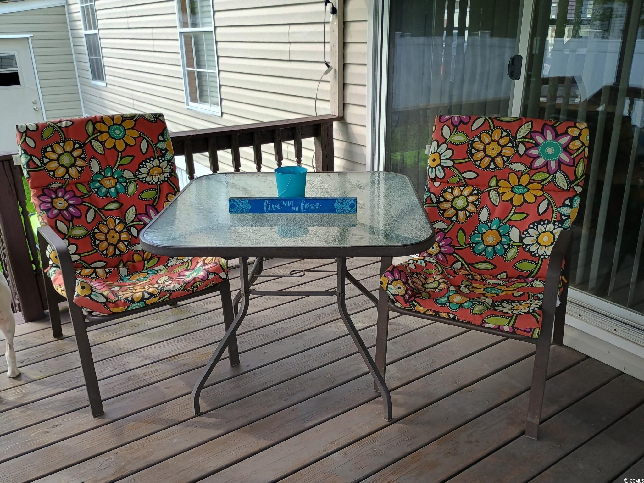 1049 Colonial Lane Conway, SC 29526 - Photo 22 of 27 Wooden terrace with outdoor dining space