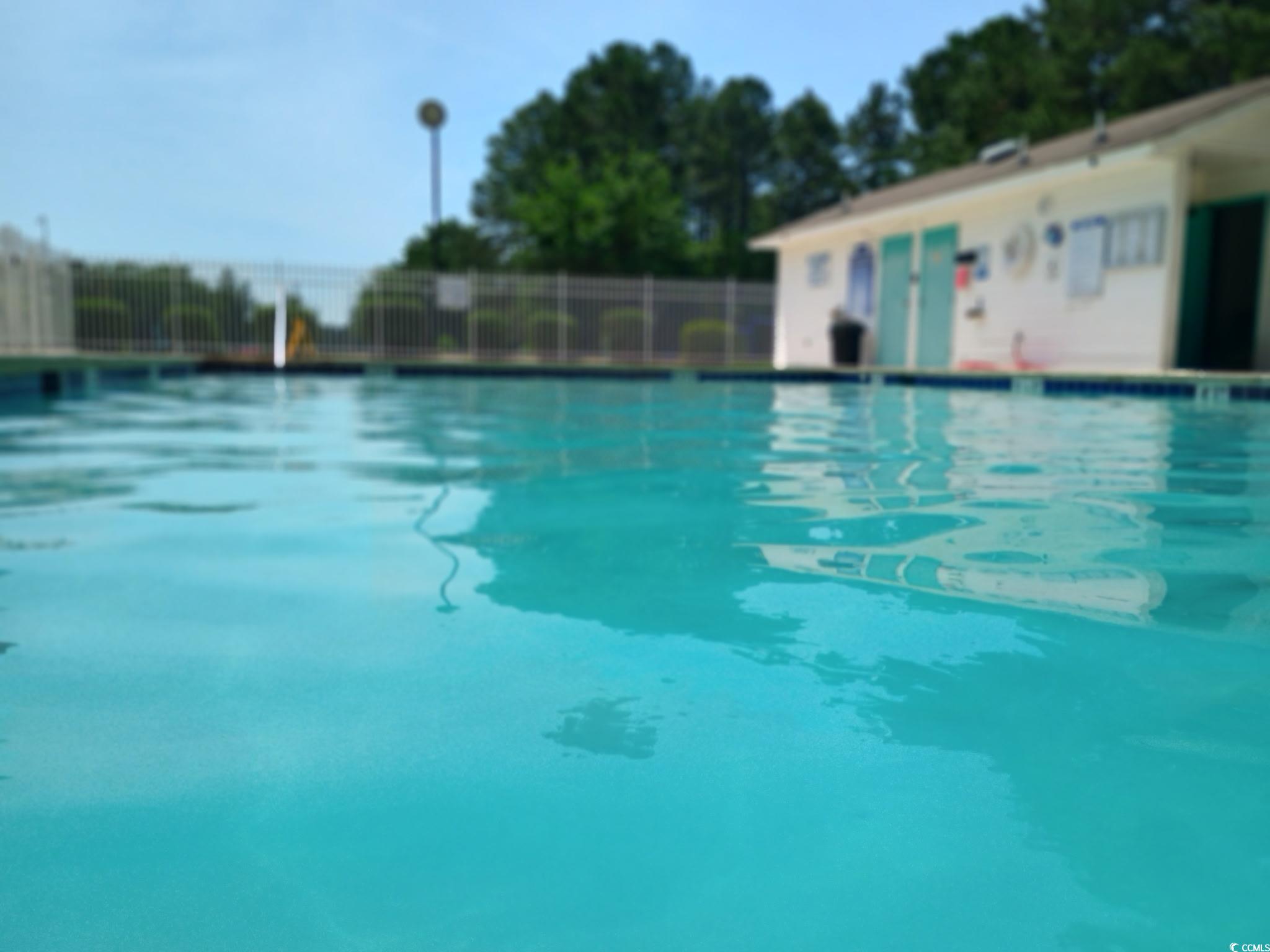 1049 Colonial Lane Conway, SC 29526 - Photo 26 of 27 Community pool with a patio