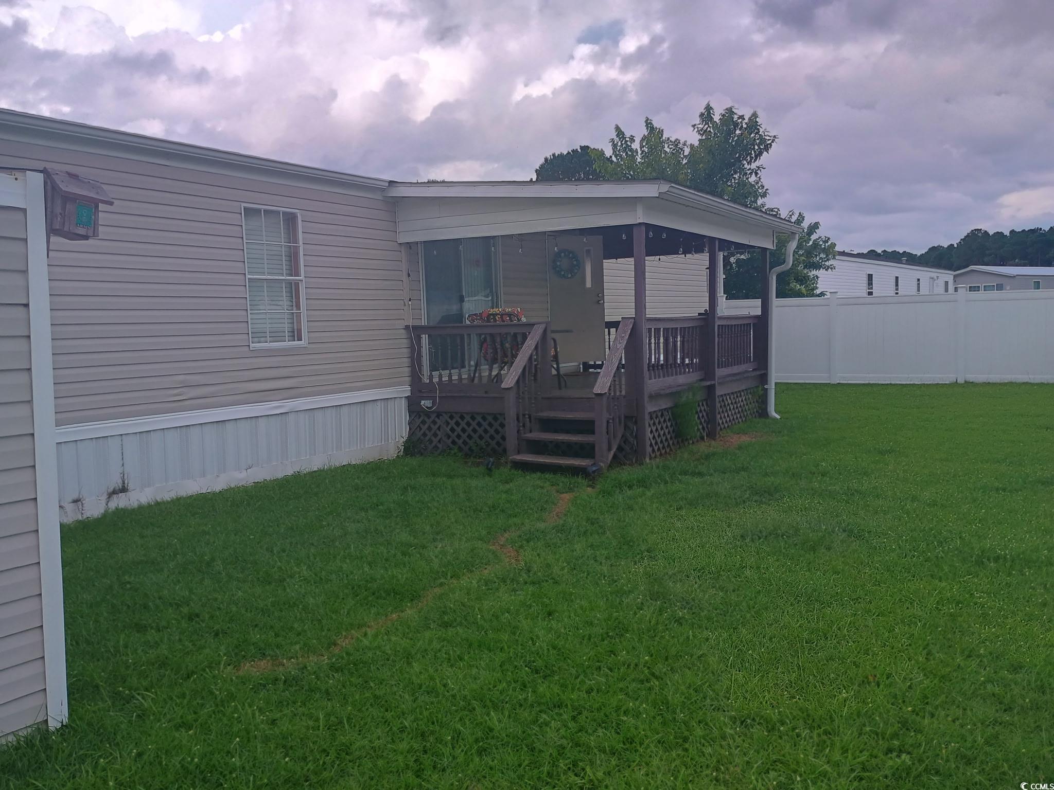 1049 Colonial Lane Conway, SC 29526 - Photo 4 of 27 Back of house featuring a deck