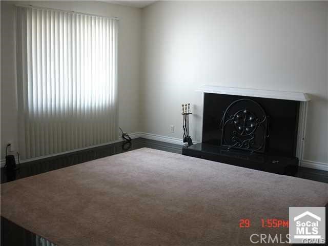 1749 North Rutherford Street Anaheim, CA 92806 - Photo 2 of 10 a living room with a fireplace
