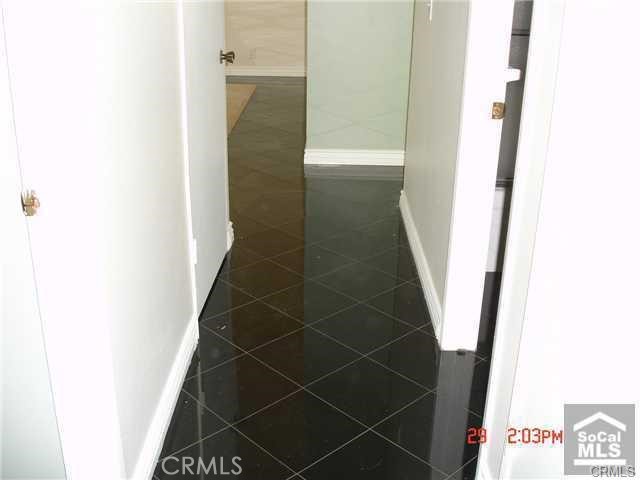 1749 North Rutherford Street Anaheim, CA 92806 - Photo 6 of 10 a bathroom with a sink and shower