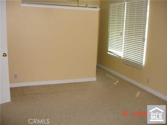 1749 North Rutherford Street Anaheim, CA 92806 - Photo 9 of 10 a view of an empty room with a window
