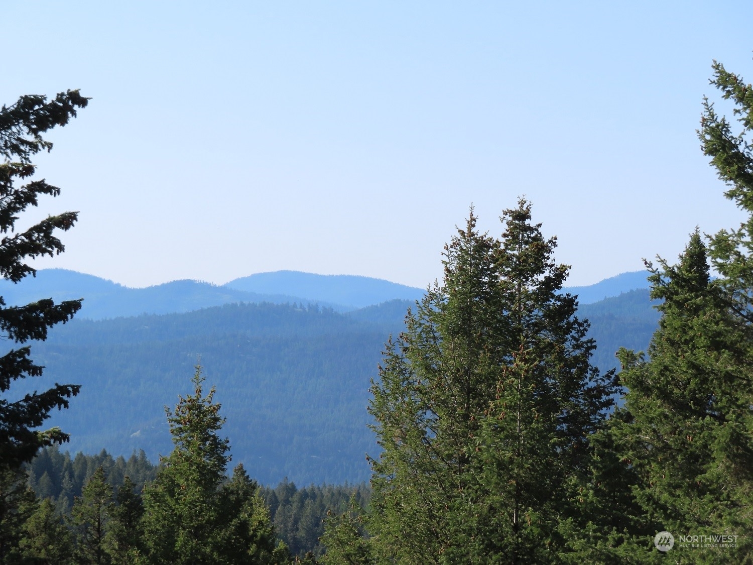 383 Pontiac Ridge Road Oroville, WA 98844 - Photo 11 of 32 an aerial view of a house