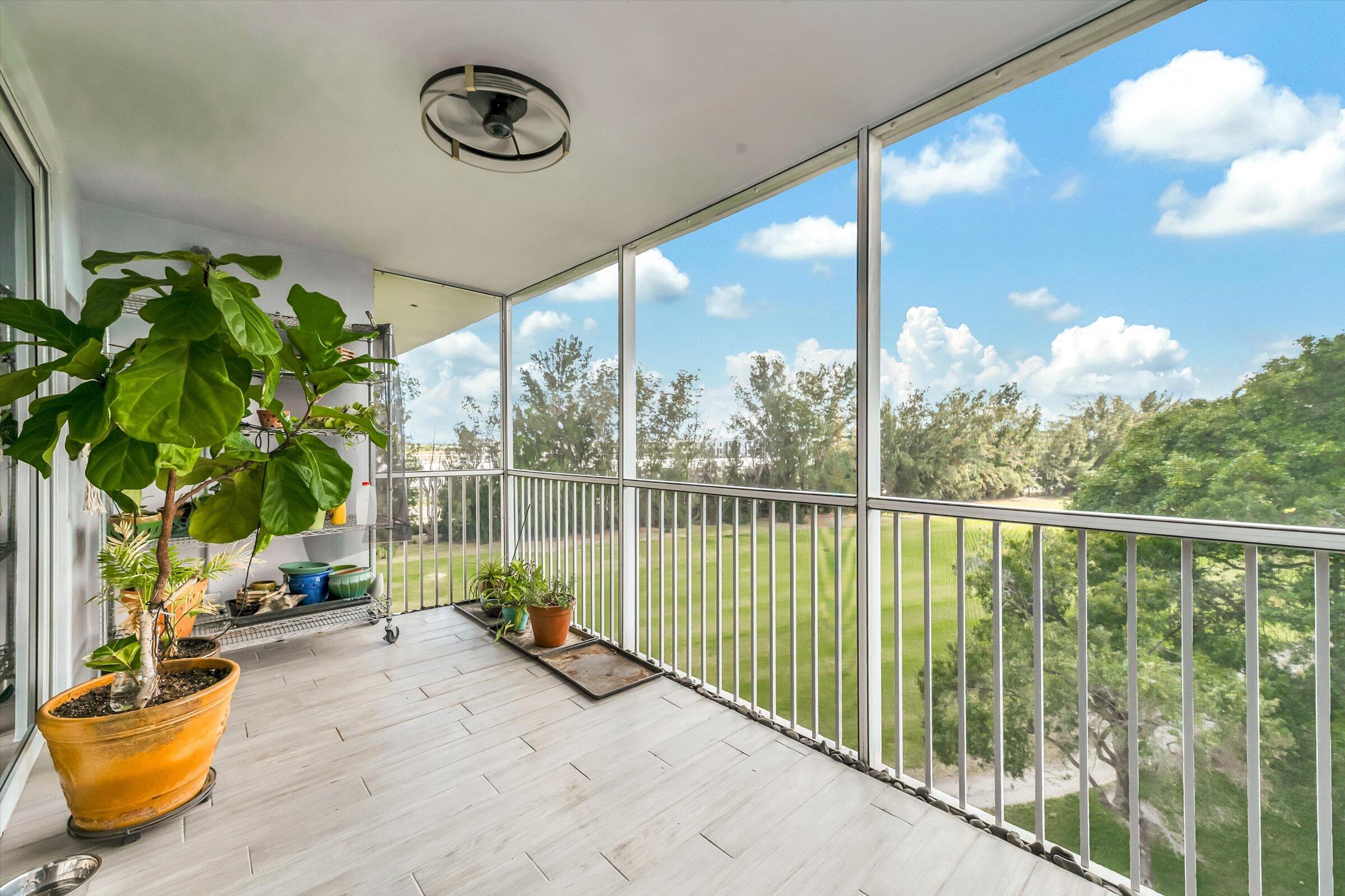 2600 South Course Drive, Unit 610 Pompano Beach, FL 33069 - Photo 17 of 33 a view of a balcony with lake view