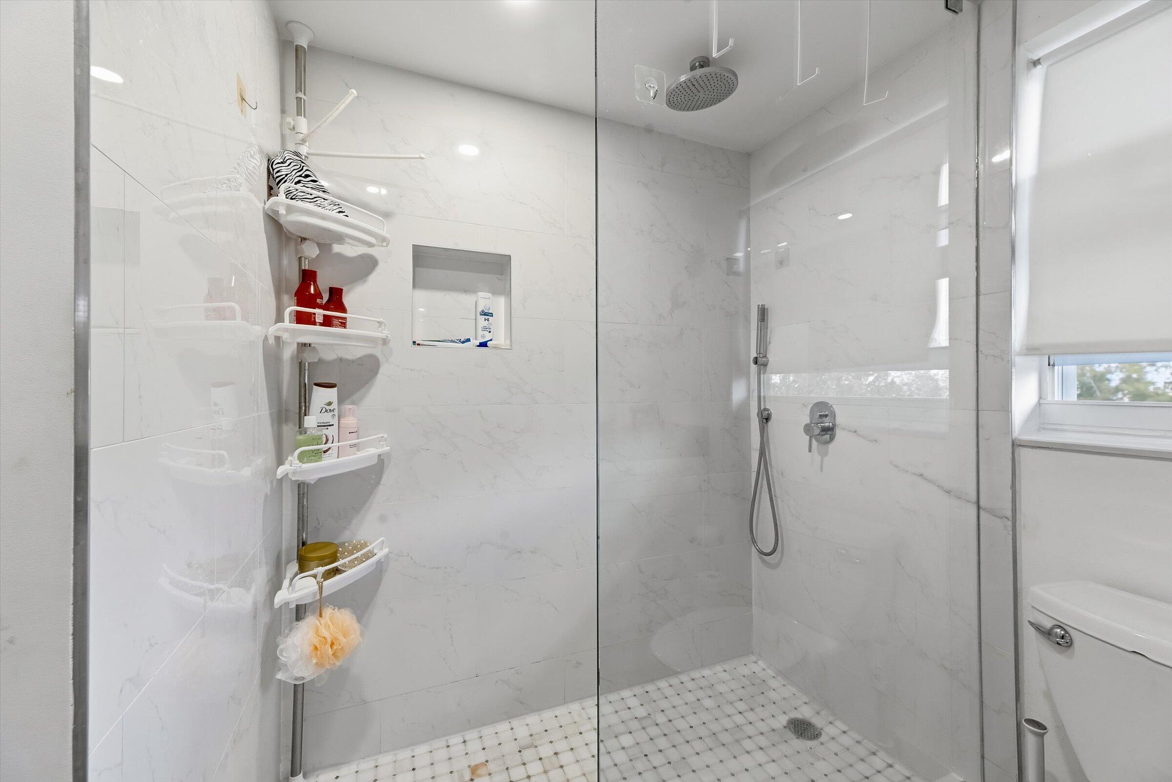 2600 South Course Drive, Unit 610 Pompano Beach, FL 33069 - Photo 33 of 33 a bathroom with a shower and a sink