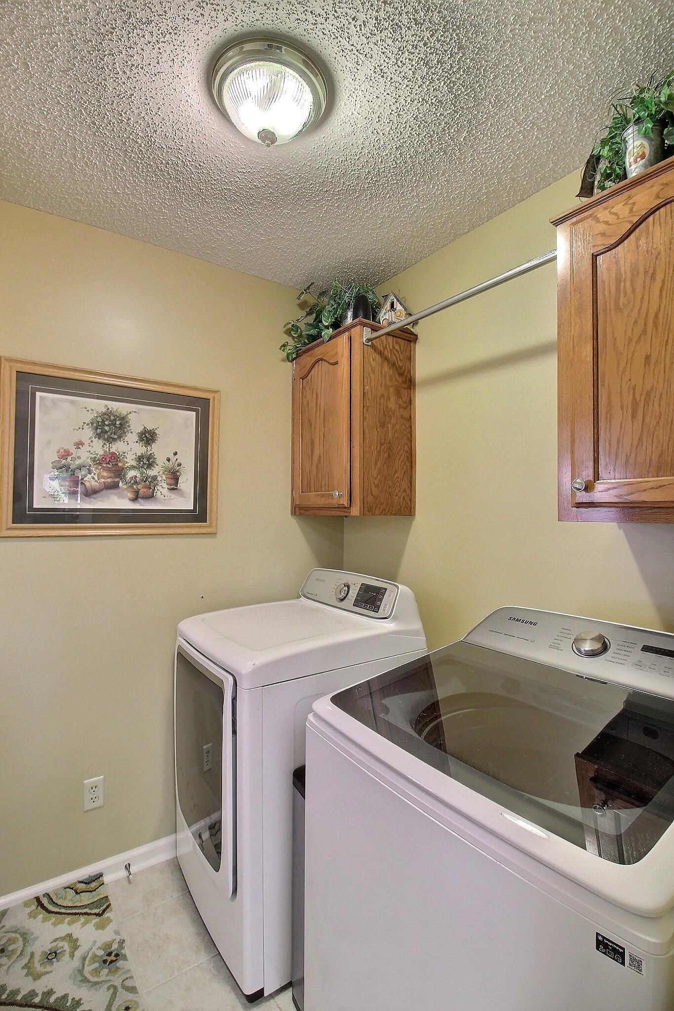 798 Early Earner Cove Collierville, TN 38017 - Photo 20 of 26 a utility room with dryer and washer
