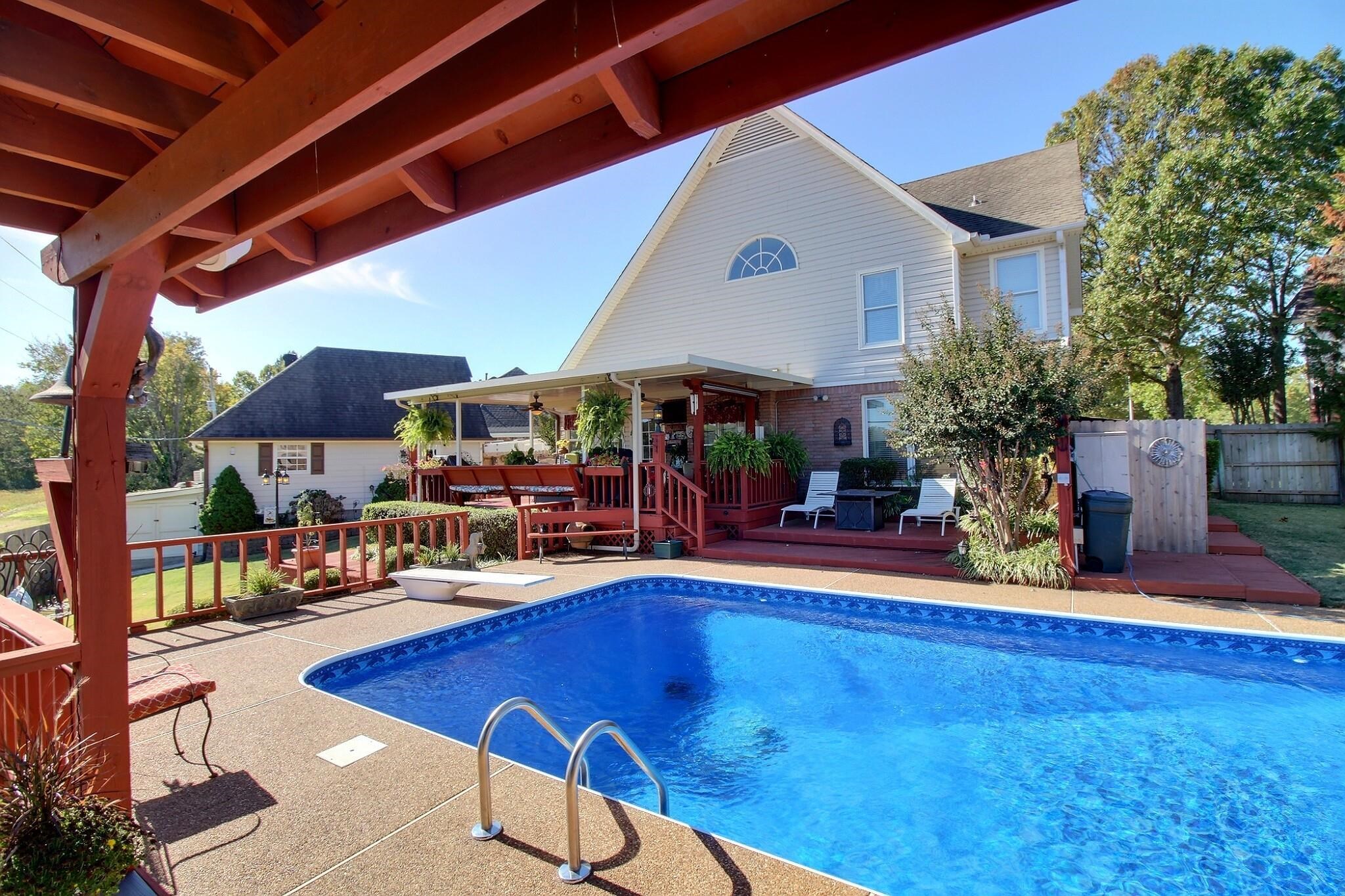 798 Early Earner Cove Collierville, TN 38017 - Photo 24 of 26 a view of an chairs and tables in patio