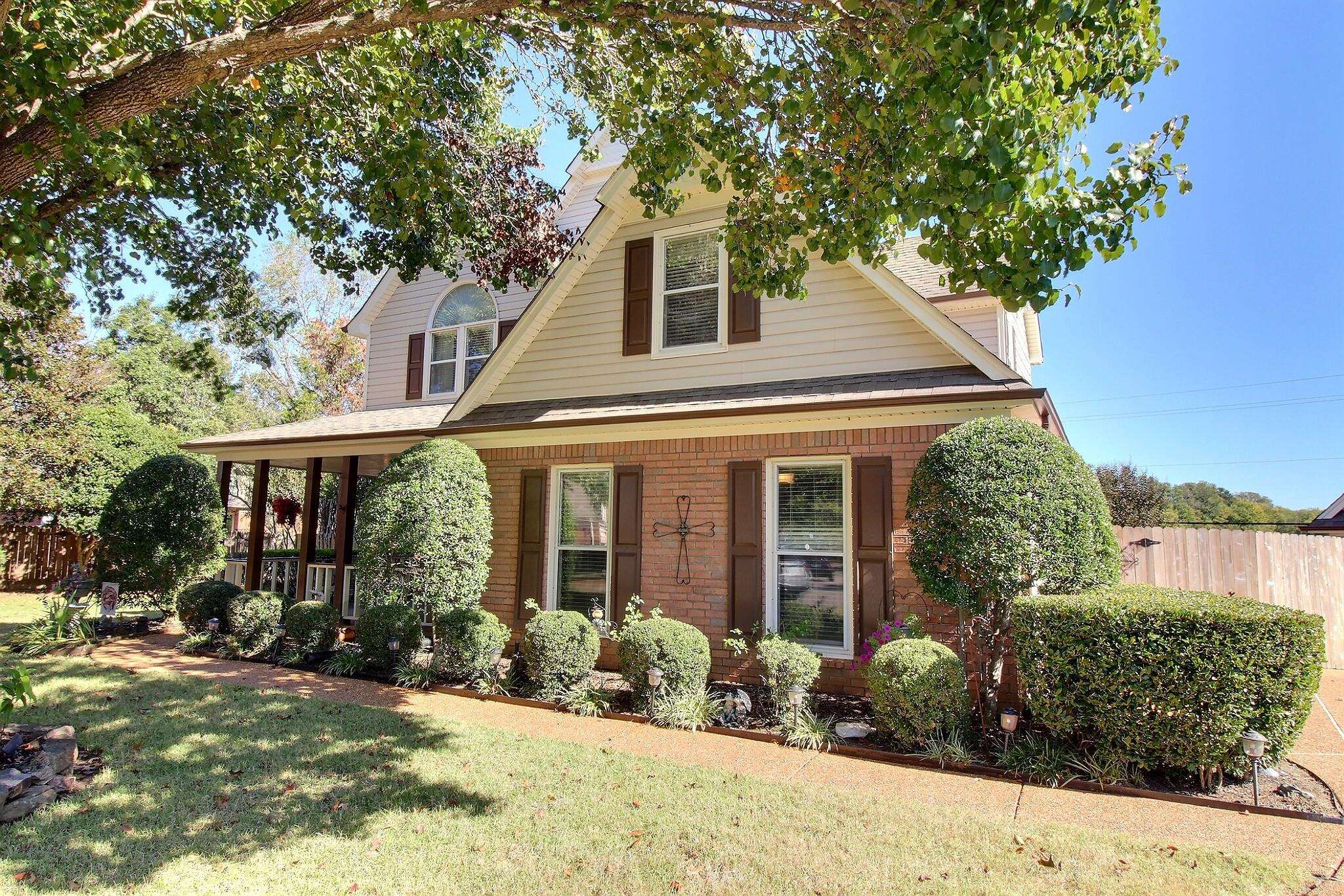 798 Early Earner Cove Collierville, TN 38017 - Photo 25 of 26 a front view of a house with a yard