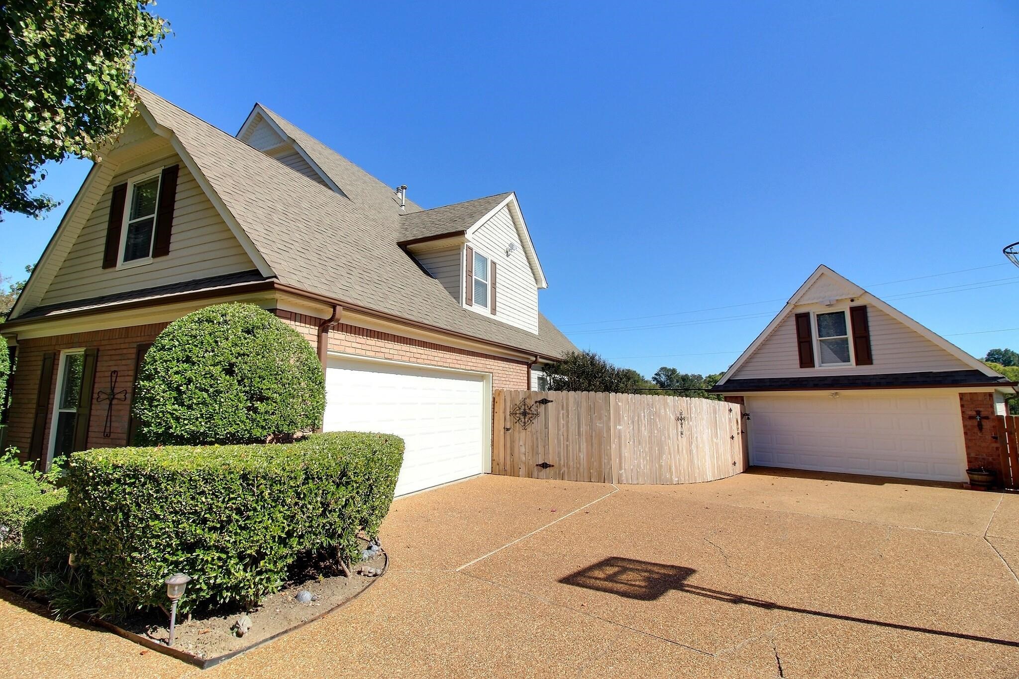 798 Early Earner Cove Collierville, TN 38017 - Photo 26 of 26 a front view of a house with a yard