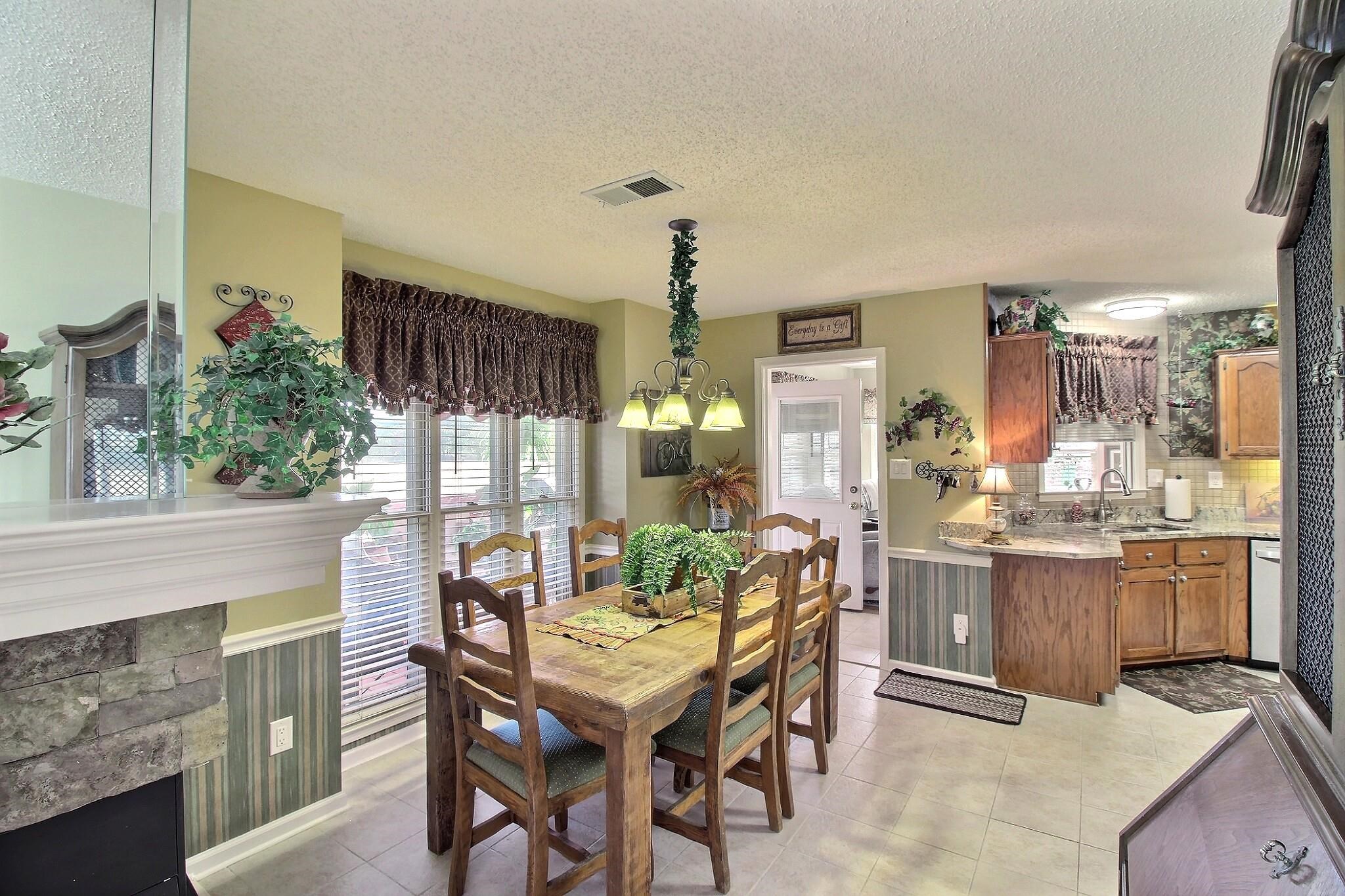 798 Early Earner Cove Collierville, TN 38017 - Photo 8 of 26 a view of a dining room with furniture window and outside view