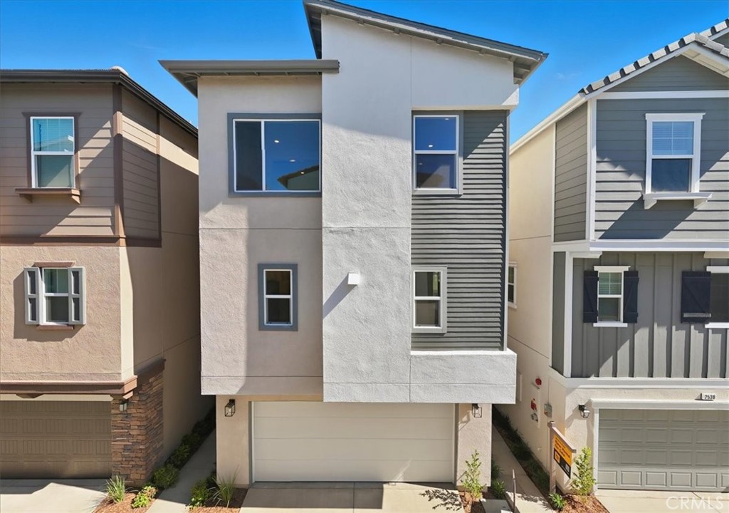 2540 Everly Street South El Monte, CA 91733 - Photo 1 of 1 a view of a white house with large windows