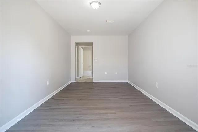 a bathroom with a bathtub a sink a vanity and a shower