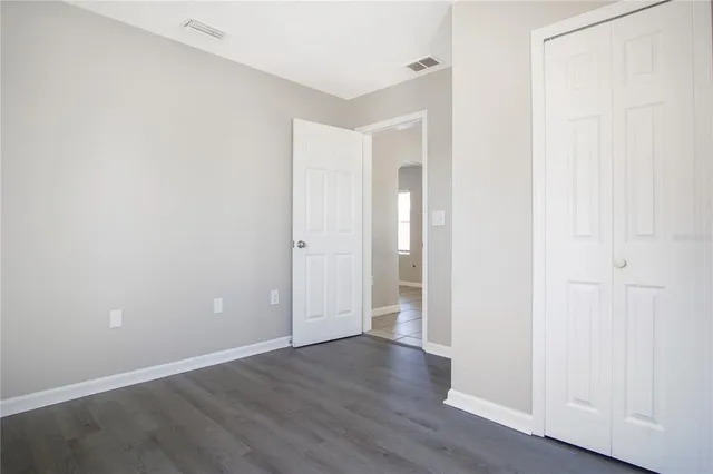 a bathroom with a shower and a window