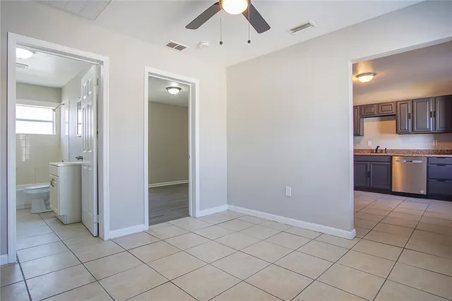 a view of a kitchen with a sink and a kitchen