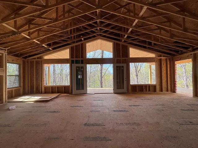 a view of a room with a large window