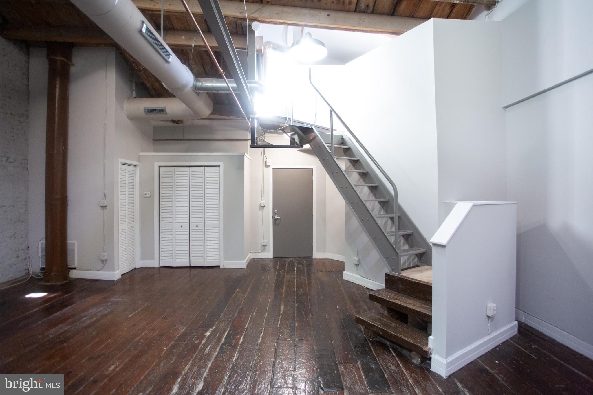 715 South 3rd Street, Unit 204 Philadelphia, PA 19147 - Photo 14 of 28 a view of entryway and hall with wooden floor