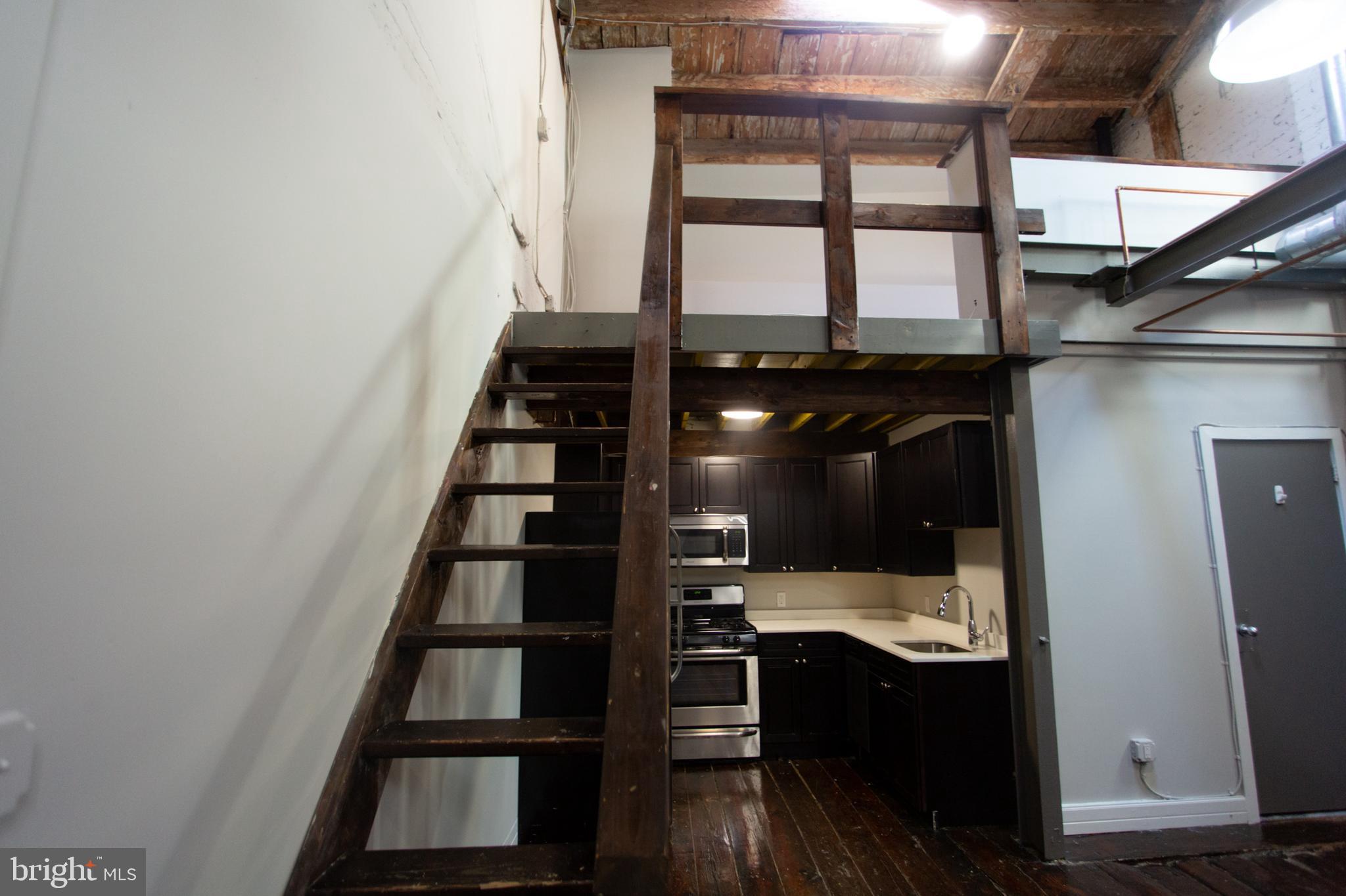 715 South 3rd Street, Unit 204 Philadelphia, PA 19147 - Photo 17 of 28 a view of staircase with a window