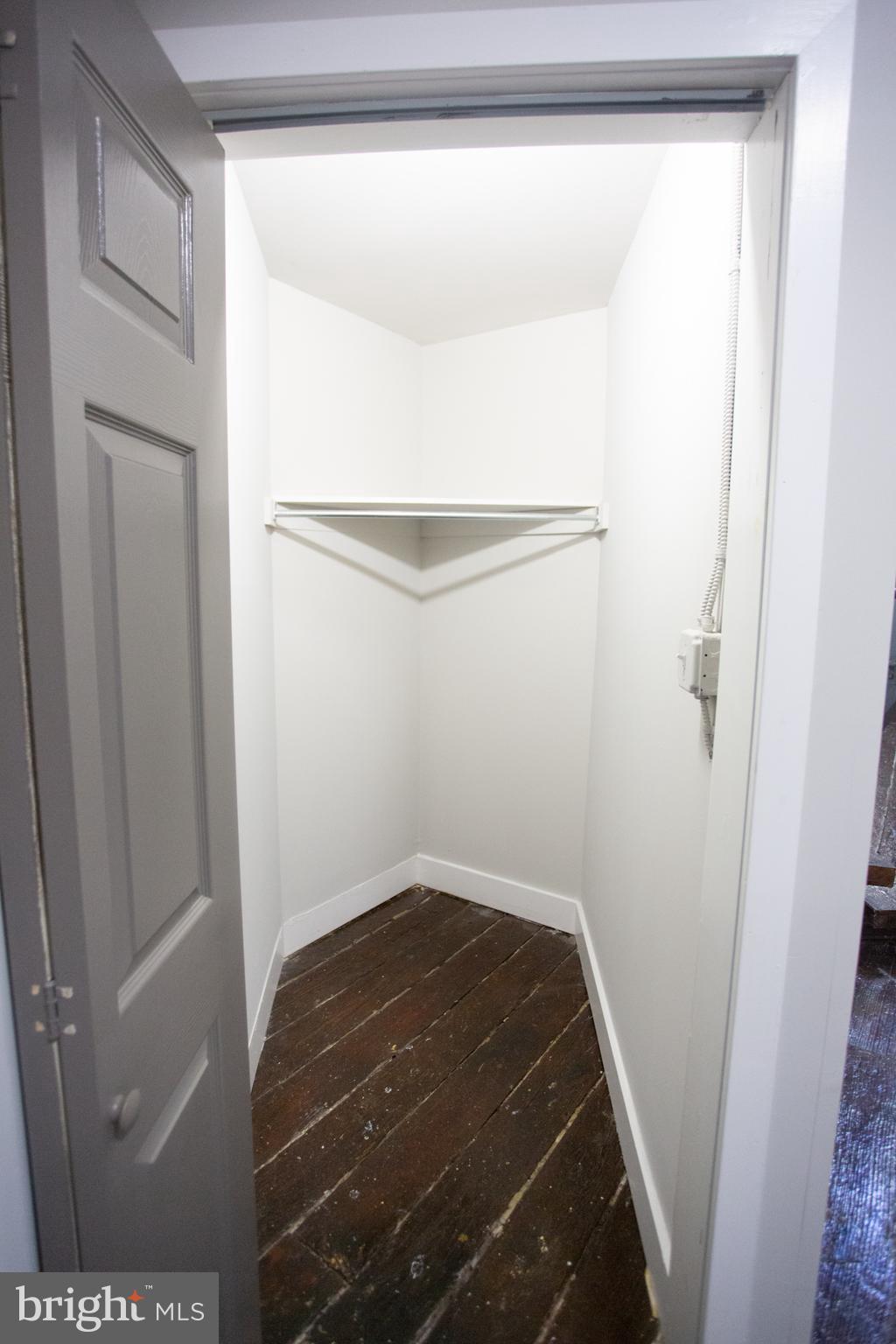 715 South 3rd Street, Unit 204 Philadelphia, PA 19147 - Photo 3 of 28 a view of small space with racks on the wall