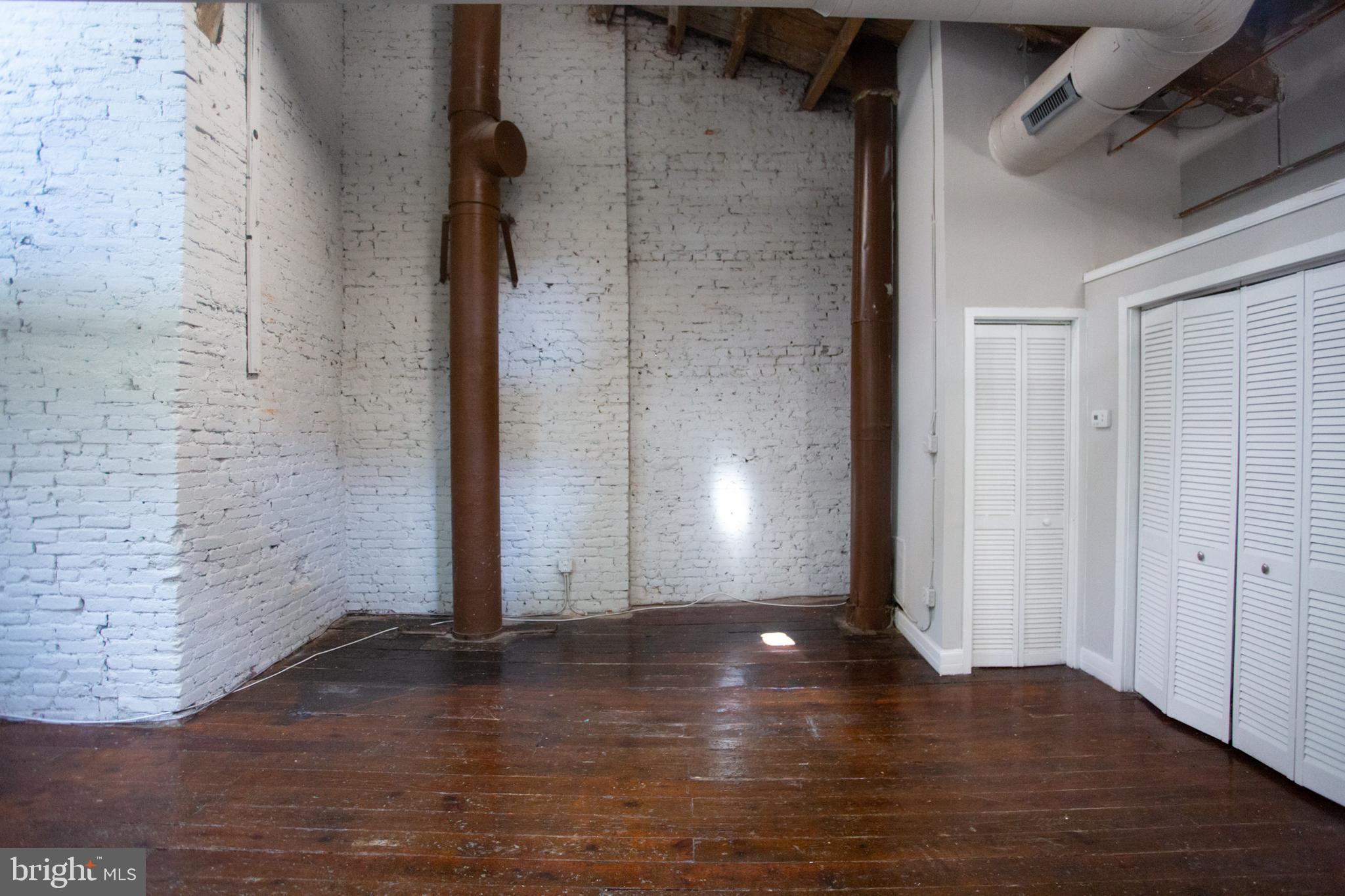 715 South 3rd Street, Unit 204 Philadelphia, PA 19147 - Photo 4 of 28 a view of empty room with wooden floor