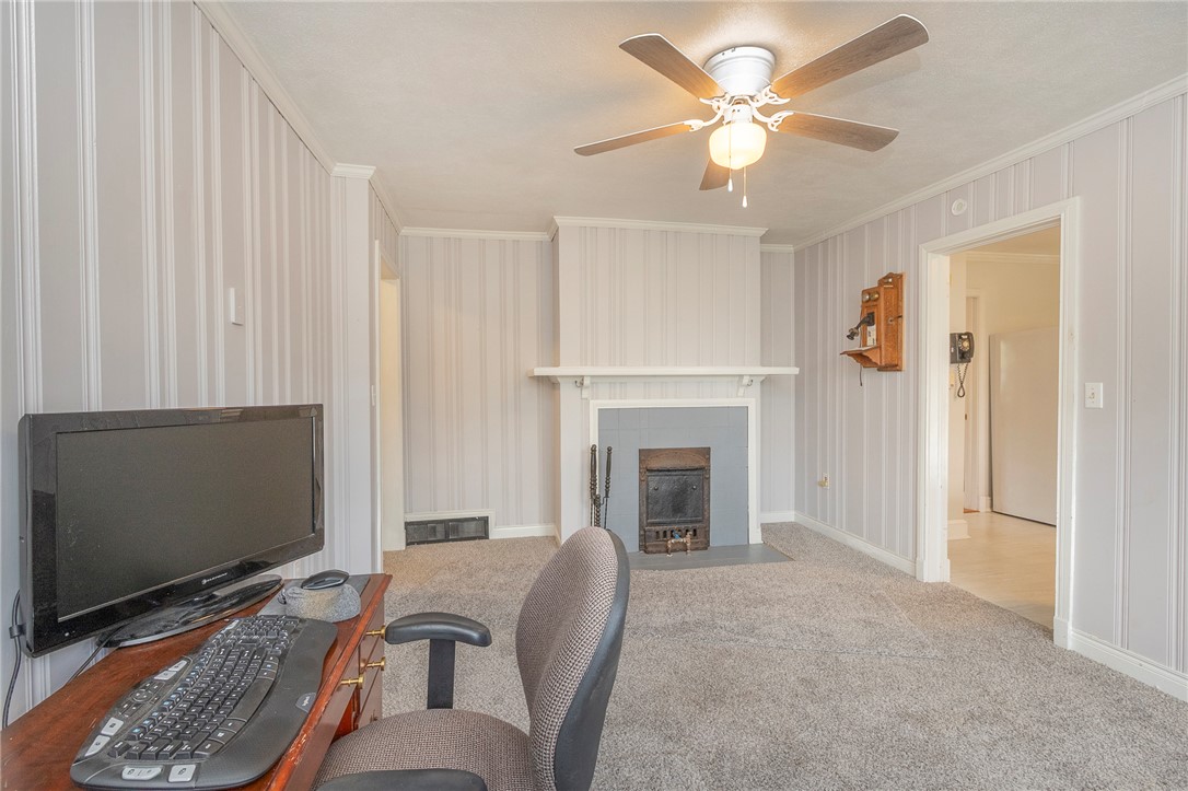 1218 Bolt Drive Anderson, SC 29621 - Photo 24 of 46 A cozy living space awaits, centered around a charming fireplace, perfect for tranquil evenings.