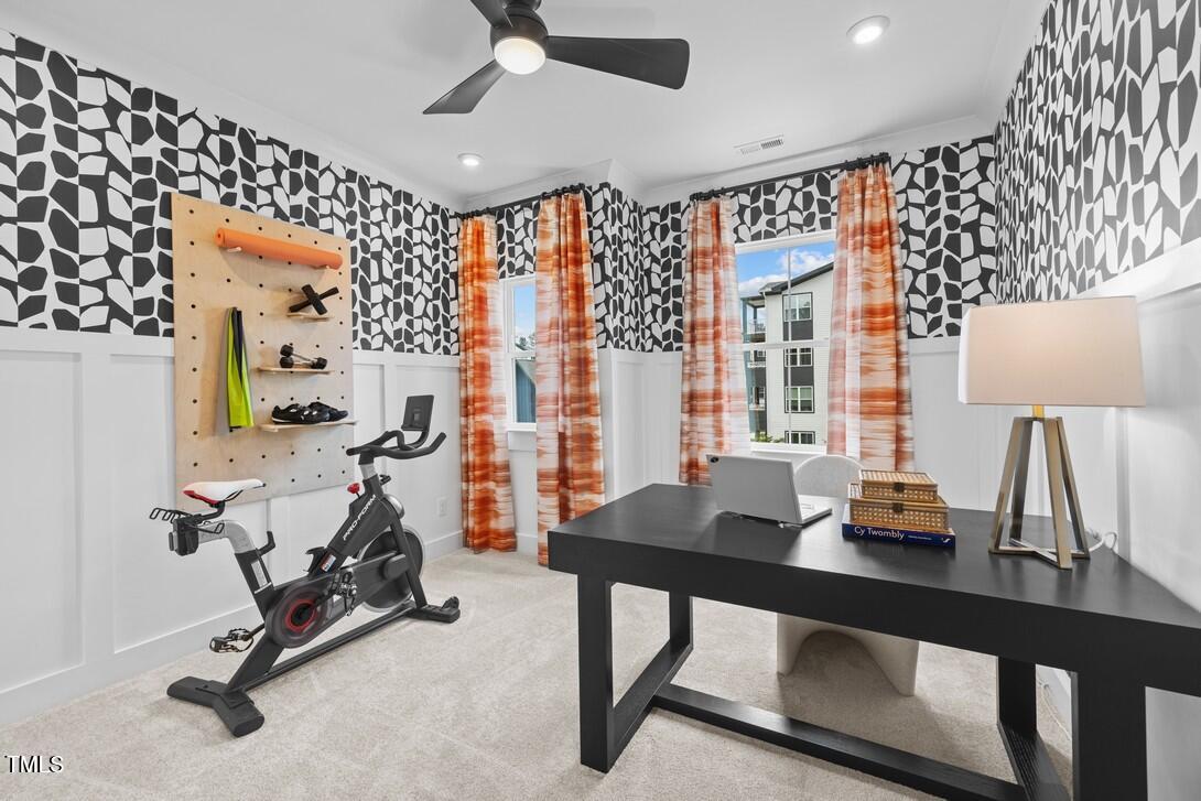 4713 Mint Leaf Lane Raleigh, NC 27612 - Photo 30 of 43 a view of a workspace with furniture and a window