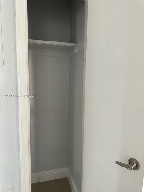 1472 Northeast 62nd Street, Unit 1472 Fort Lauderdale, FL 33334 - Photo 13 of 19 a view of closet
