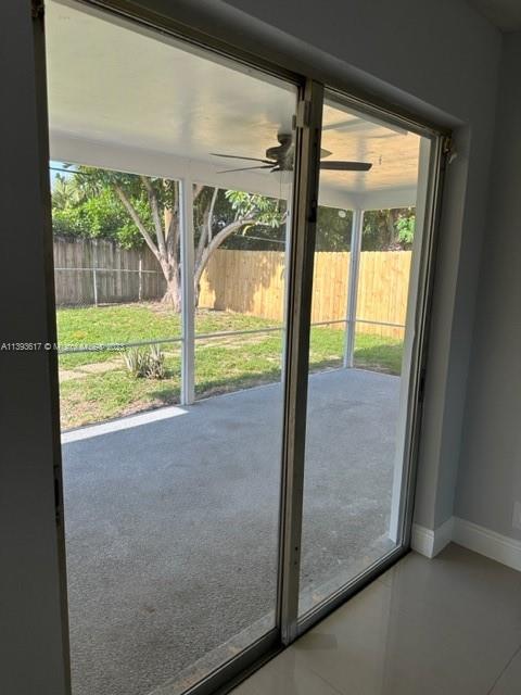 1472 Northeast 62nd Street, Unit 1472 Fort Lauderdale, FL 33334 - Photo 14 of 19 a view of a room with yard from a window
