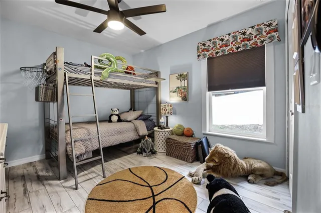 a bedroom with furniture and a bed