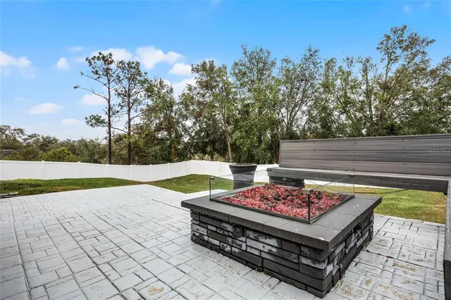 a view of a sitting area with furniture and a yard