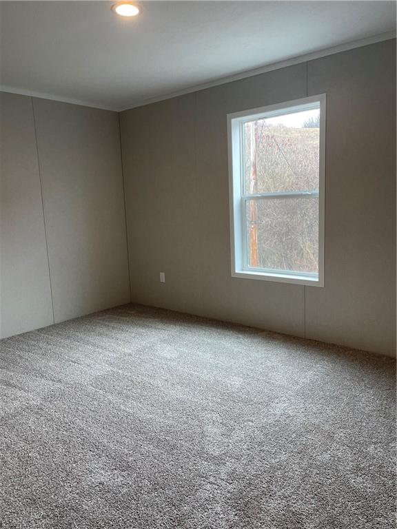 1410 A Hidden Valley Road Bulger, PA 15019 - Photo 9 of 13 an empty room with a window