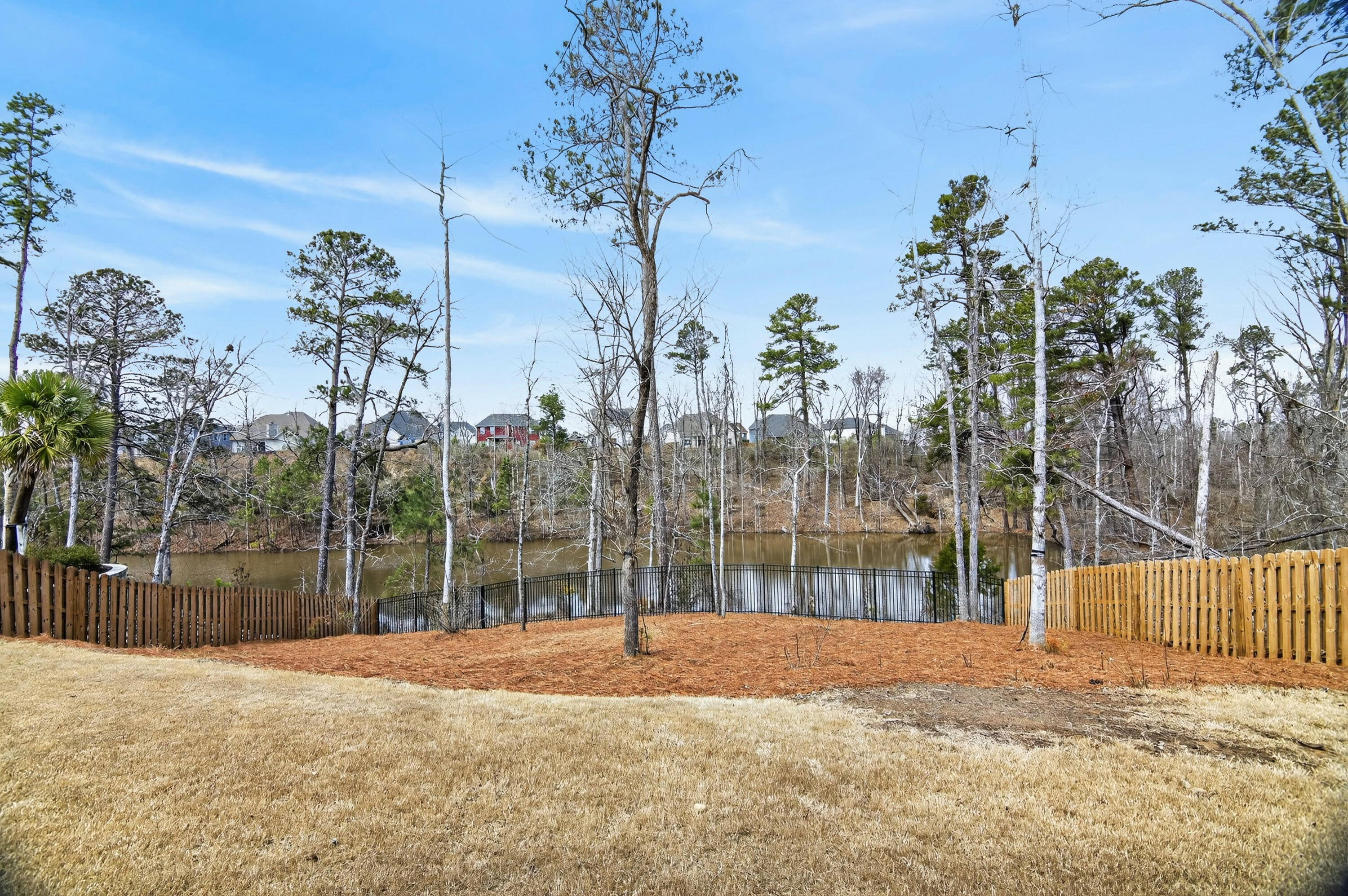 638 Bunchgrass Street Evans, GA 30809 - Photo 54 of 67 Beautiful backyard view of wooded lot and stocked pond