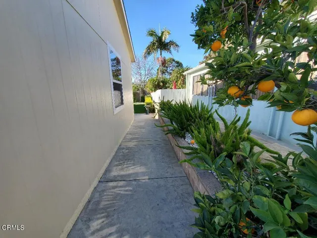 a living room with lots of furniture and a window