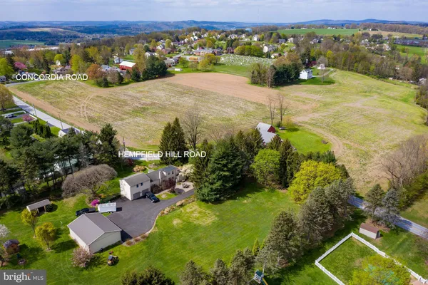 a view of a lake with a yard