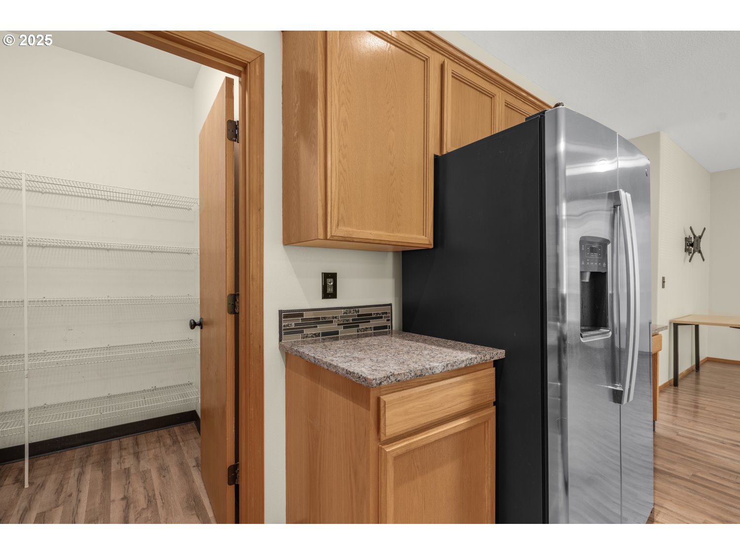 1512 Southwest 5th Street Battle Ground, WA 98604 - Photo 11 of 25 a kitchen with a refrigerator and cabinets