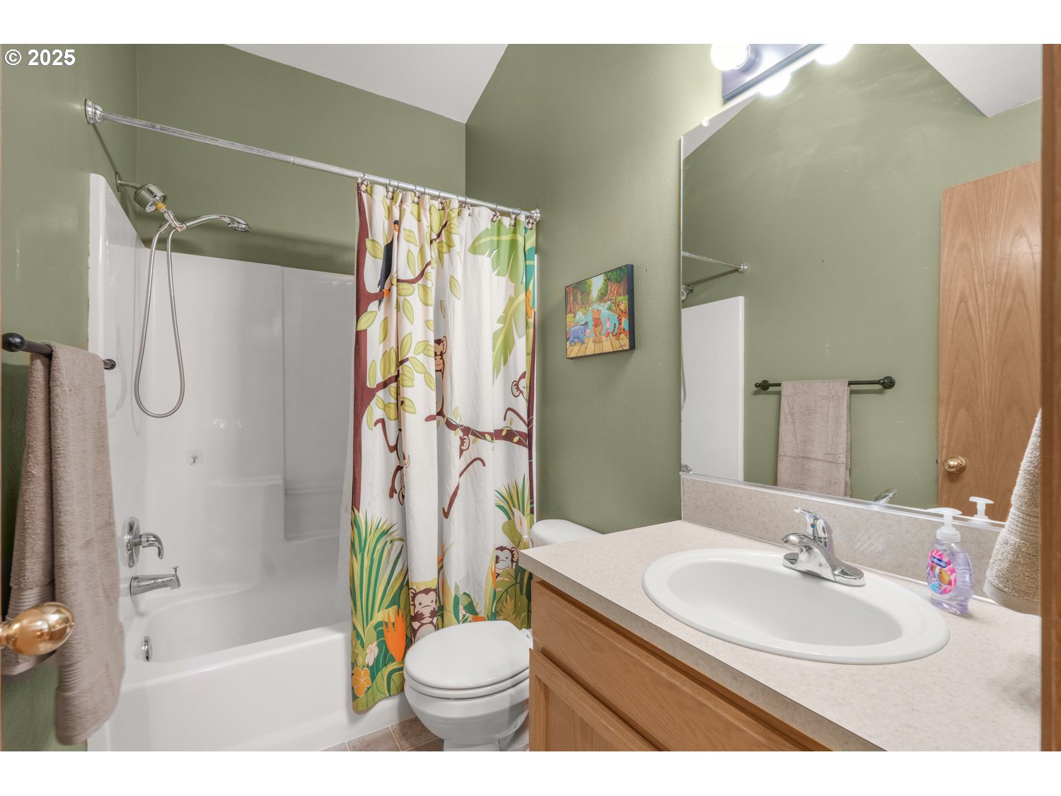 1512 Southwest 5th Street Battle Ground, WA 98604 - Photo 21 of 25 a bathroom with a granite countertop sink toilet and shower
