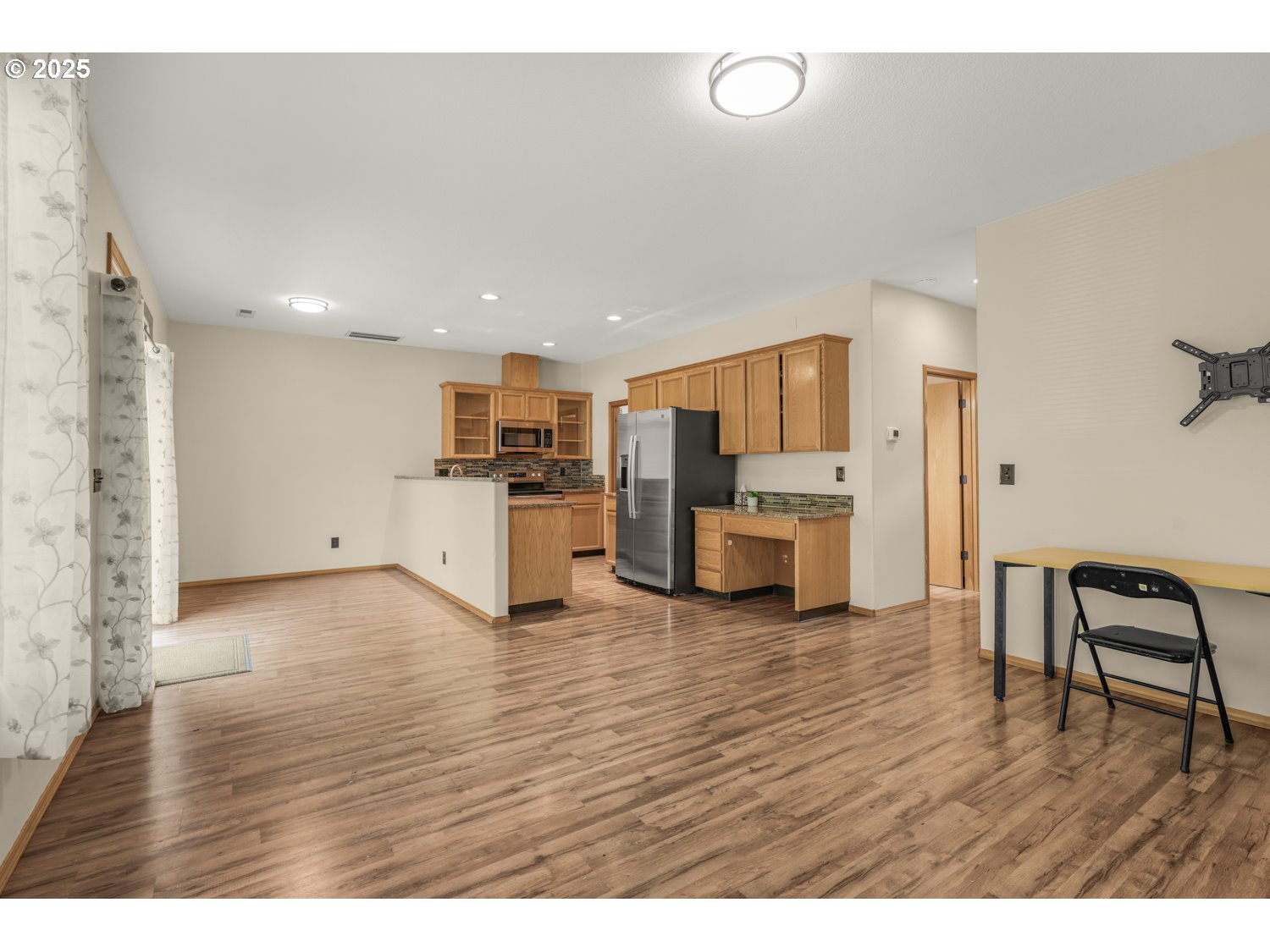 1512 Southwest 5th Street Battle Ground, WA 98604 - Photo 4 of 25 a view of kitchen with furniture and wooden floor