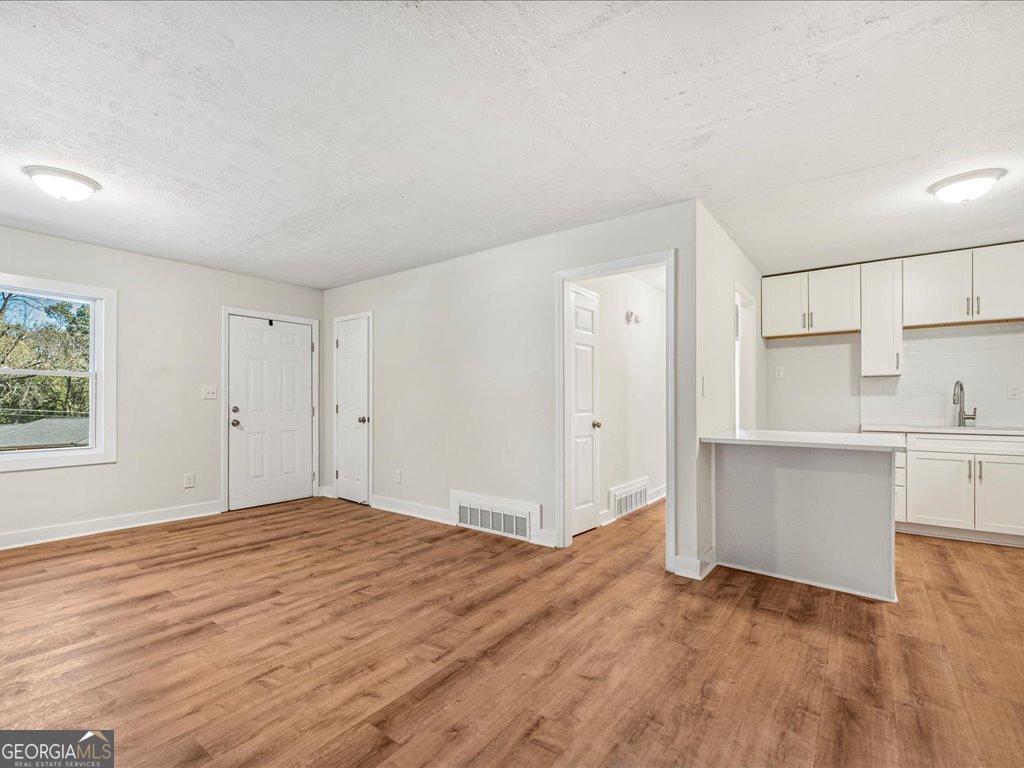 2905 Gresham Rd S East Atlanta, GA 30316 - Photo 14 of 27 a bedroom with a bed and a window