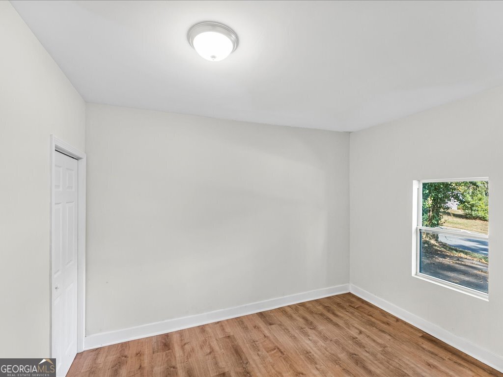 2905 Gresham Rd S East Atlanta, GA 30316 - Photo 23 of 27 an empty room with a window