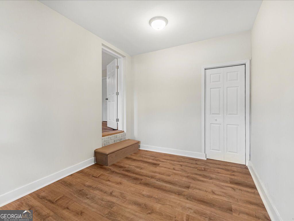 2905 Gresham Rd S East Atlanta, GA 30316 - Photo 24 of 27 wooden floor in a hall with an entryway