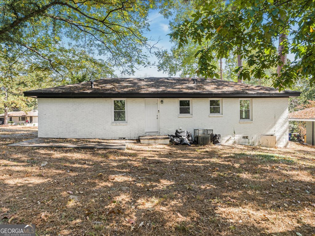 2905 Gresham Rd S East Atlanta, GA 30316 - Photo 26 of 27 a backyard of a house with table and chairs