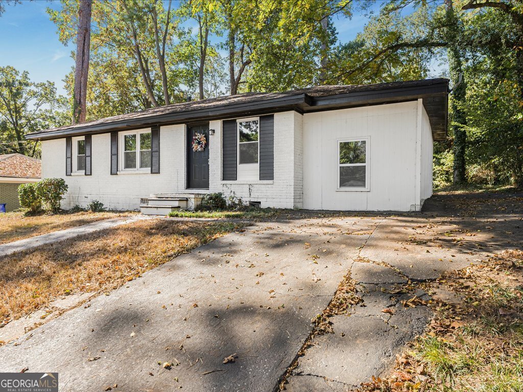 2905 Gresham Rd S East Atlanta, GA 30316 - Photo 6 of 27 a front view of a house with a yard